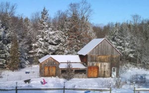 Snow-covered barn